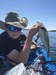Q with smallie thumb